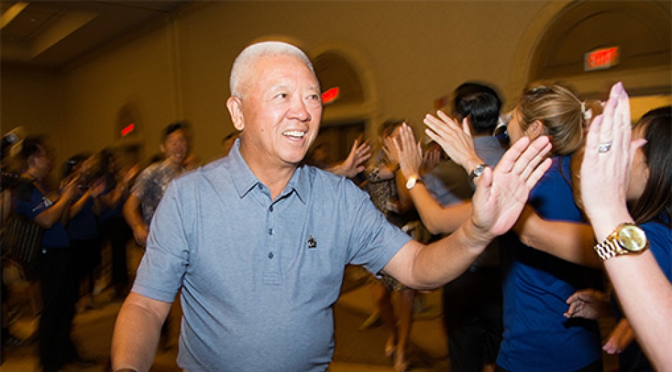 Andrew Cherng high five