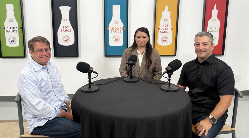 David, Cristina, and Hector sit at table recording podcast